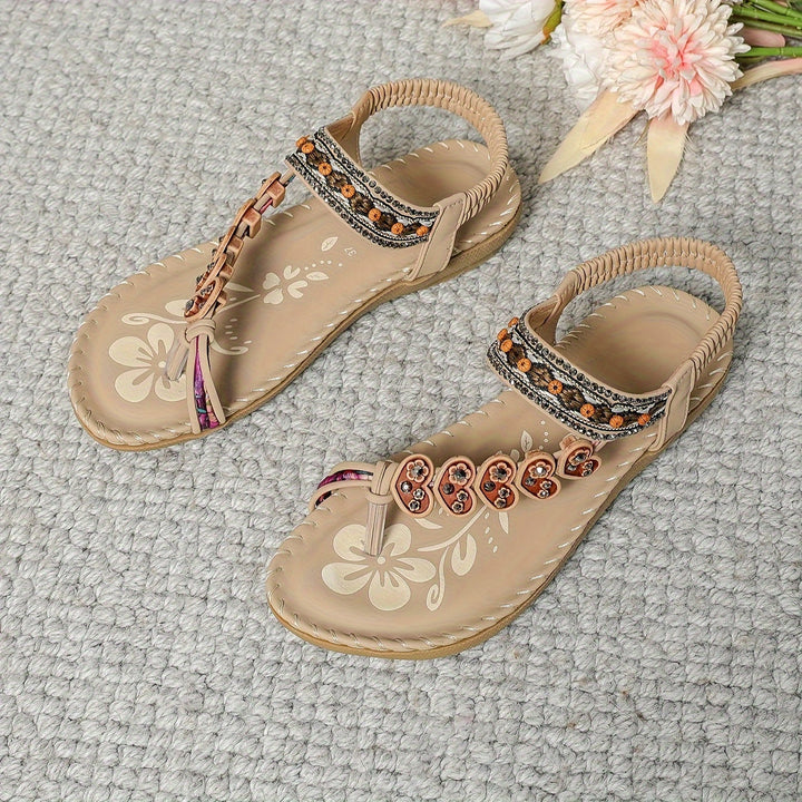 Durable women's orthopedic sandals with contoured footbed, arch support & adjustable straps for comfort.