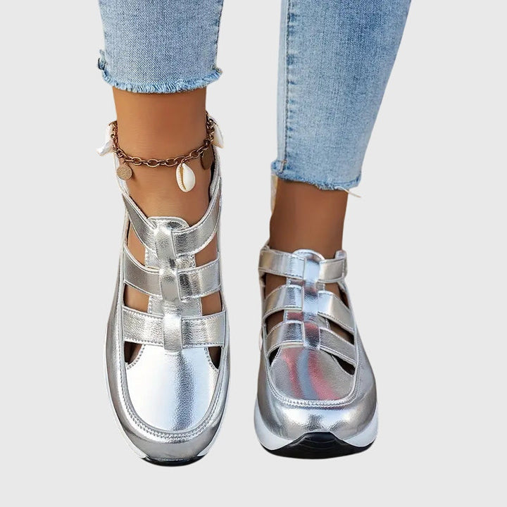 Detail shot: Integrated arch support system in women's comfortable orthopedic casual sandals.