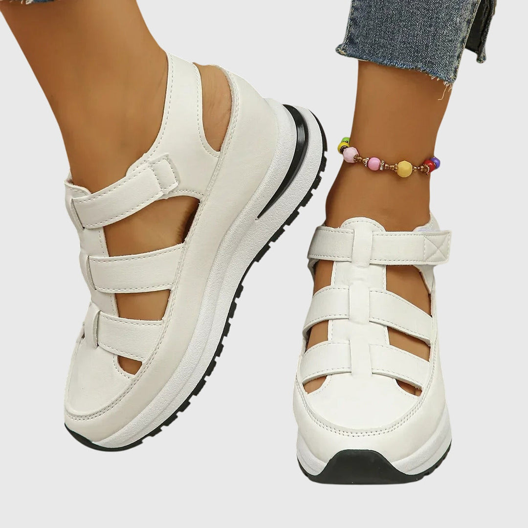 Durable women's orthopedic sandals with soft footbed, non-slip sole, and adjustable arch support.