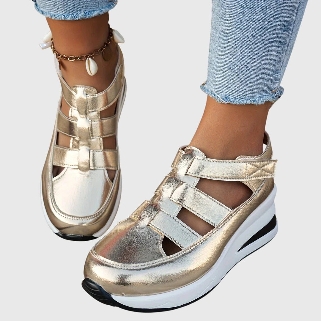 Comfortable women's walking sandals with adjustable arch support, perfect for active summer days.