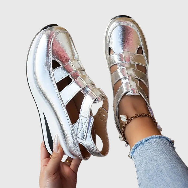 Top-down view of women's orthopedic sandals, highlighting adjustable fit & superior arch support.