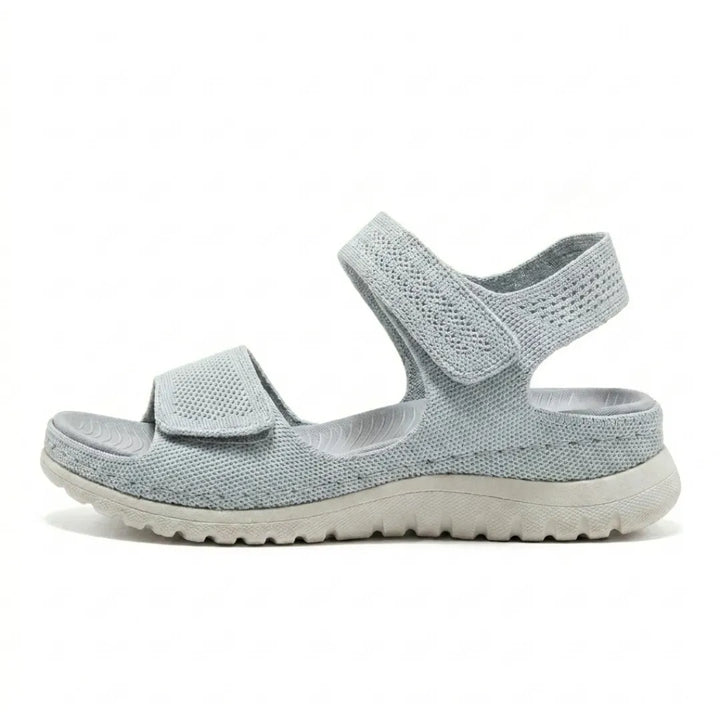 Women's walking sandals, adjustable & comfortable, with arch support for everyday wear.