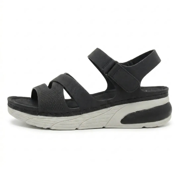 Women's orthopedic sandals with adjustable straps & arch support for comfortable walking.