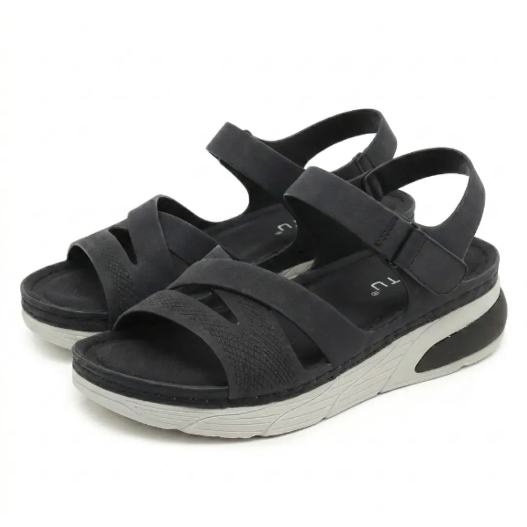 Orthopedic women's arch support sandals for daily wear, adjustable & offering foot relief.