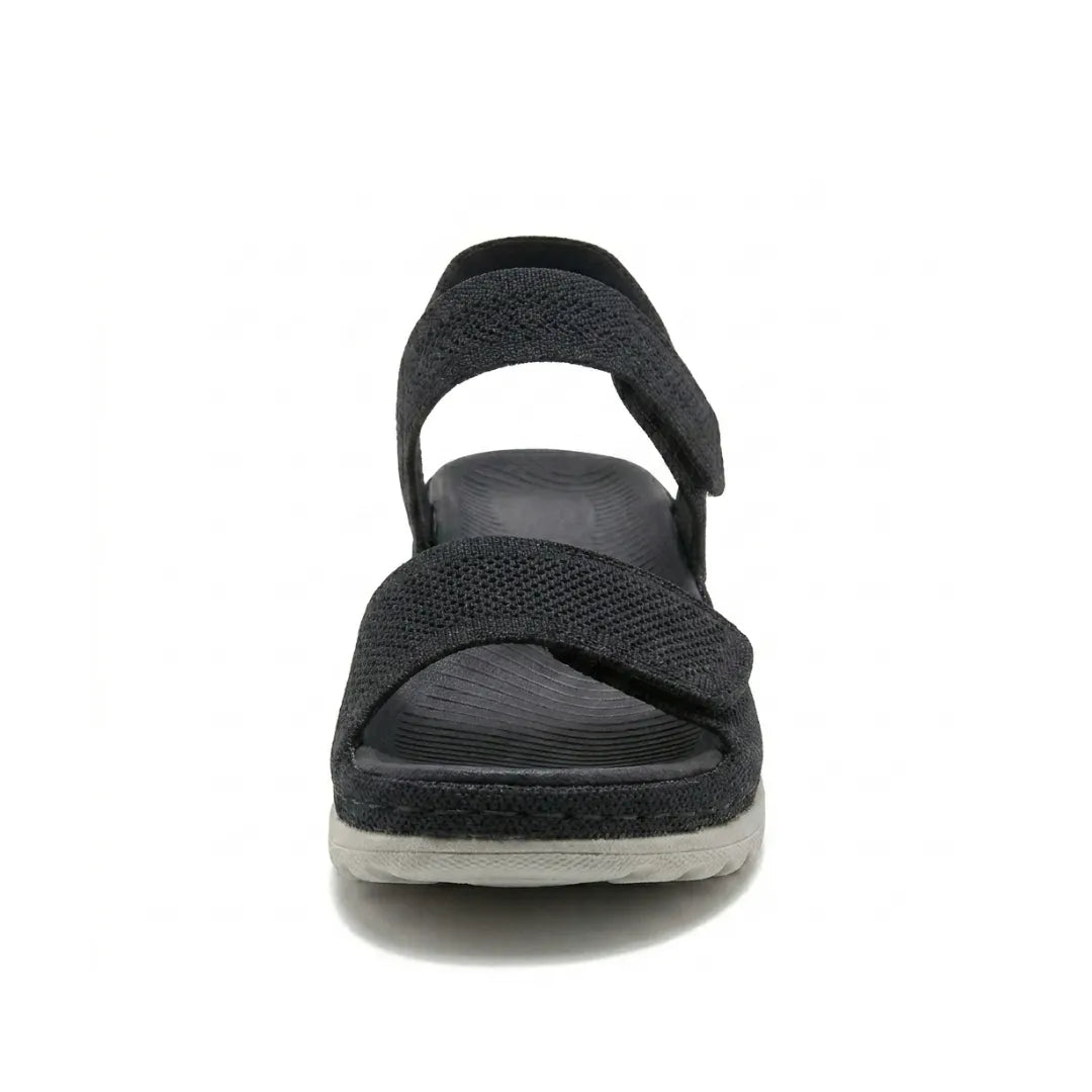 Women's casual sandals with adjustable straps, open-toe design for walking comfort & support.