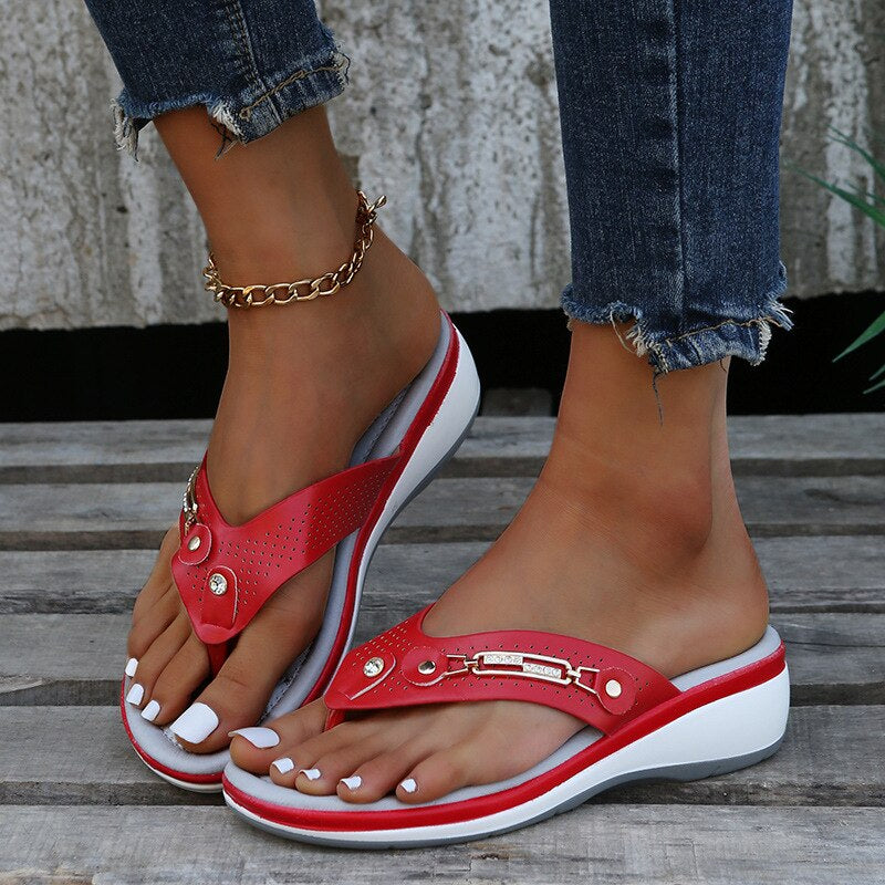 Women's orthopedic comfort sandals with deep arch support, padded footbed, and adjustable straps.