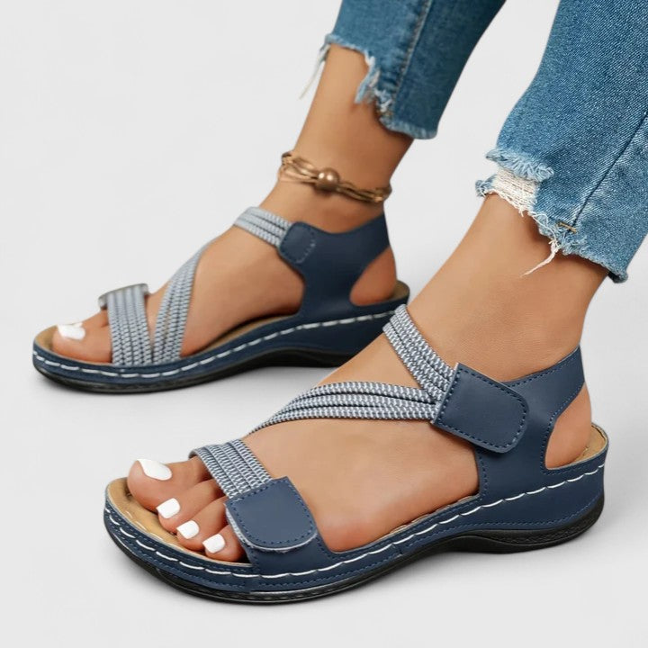 Relieve plantar fasciitis with women's orthopedic sandals, offering excellent three-arch support.
