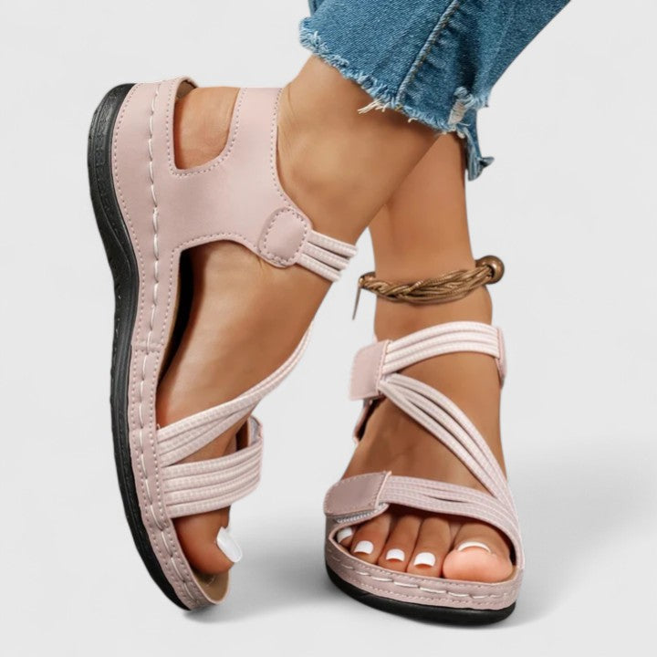 Women's orthopedic walking sandals providing three-arch and posture support for healthy feet.