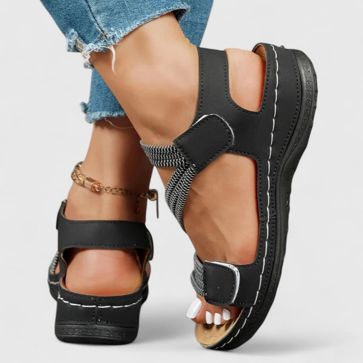 Women's walking orthopedic sandals with three-arch support for active, pain-free summer days.