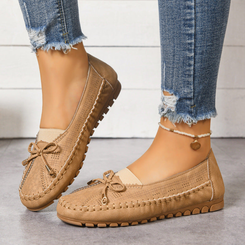 Women's orthopedic slip-on loafers, wide fit for cushioned comfort and foot support.