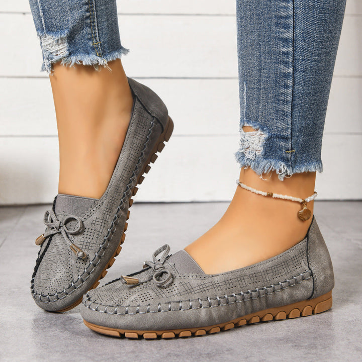 Everyday women's wide fit flats, easy slip-on style with orthopedic comfort and support.