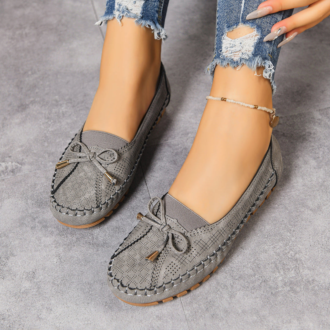 Supportive women's casual loafers, ideal for walking, with a comfortable wide fit and cushioning.