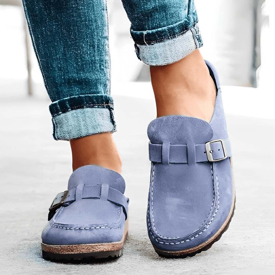 Lightweight women's orthopedic slip-on mules, engineered for all-day comfort, foot health & casual support.