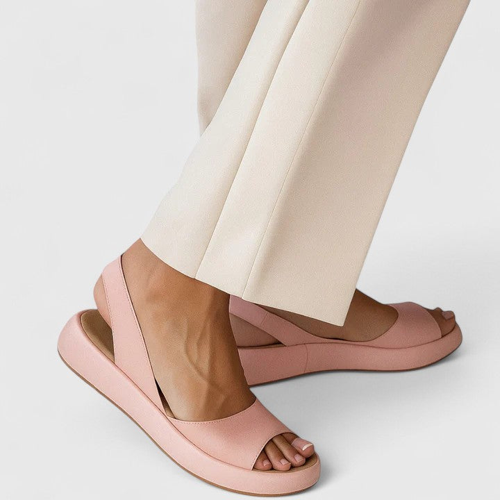 Women's orthopedic slip-on sandals with cushioned insole & arch support for ultimate comfort. Perfect summer footwear.