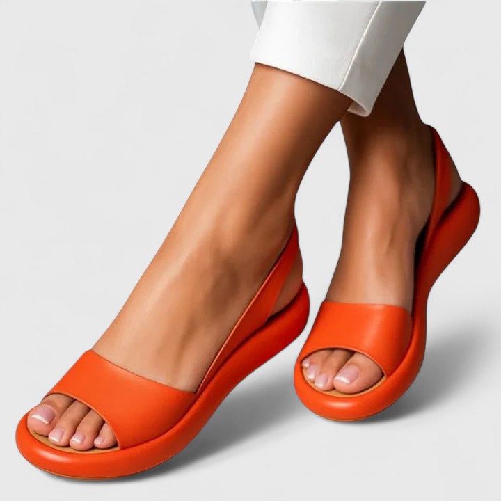 Elegant women's slip-on comfort sandals with orthopedic arch support. Lightweight & shock-absorbing for casual wear.