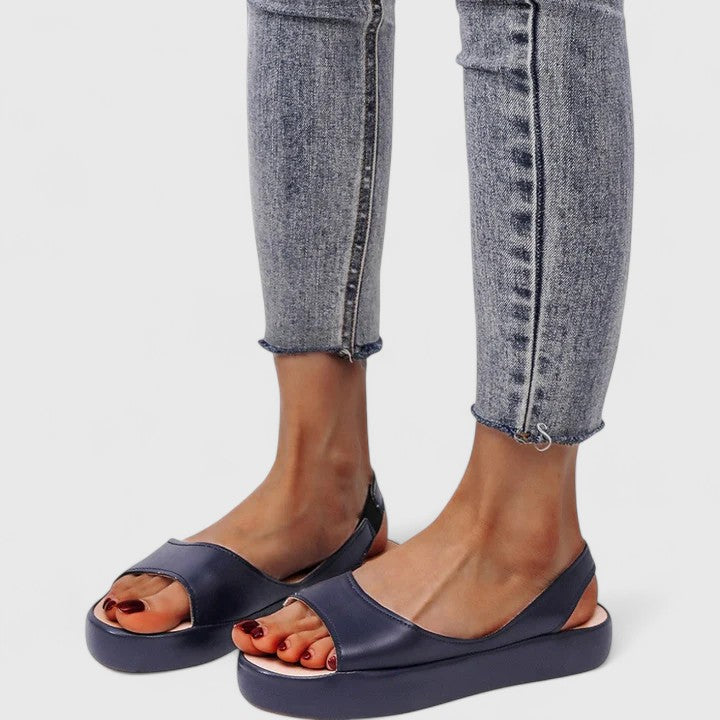 Easy slip-on women's orthopedic sandals, featuring cushioned insole & arch support. Lightweight comfort for daily wear.