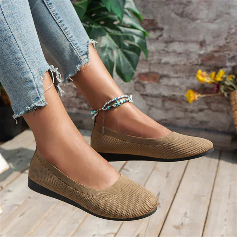 Stylish women's slip-on shoes with advanced arch support and non-slip sole for secure walking.