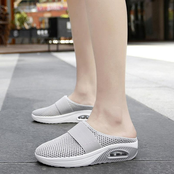 Back view of women's supportive slip-on walking shoes, designed for daily comfort.