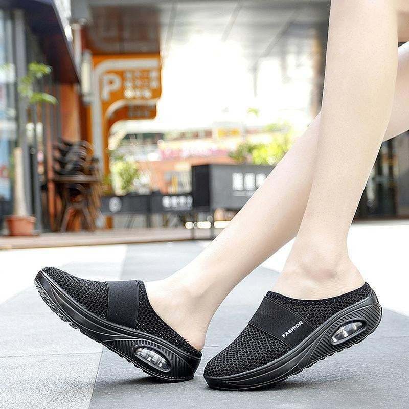 Close-up of breathable fabric on women's orthopedic slip-on walking shoes, ultimate comfort.