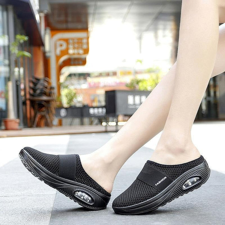 Close-up of breathable fabric on women's orthopedic slip-on walking shoes, ultimate comfort.