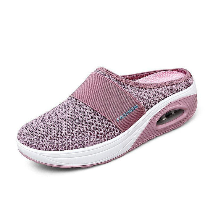 Woman wearing comfortable slip-on orthopedic walking shoes for casual daily activities.