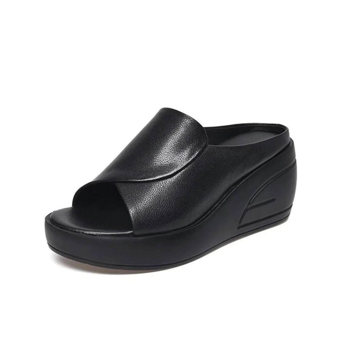 Stylish women's slip-on wedge sandals for easy wear. Fashionable open-toe design with comfortable orthopedic support.