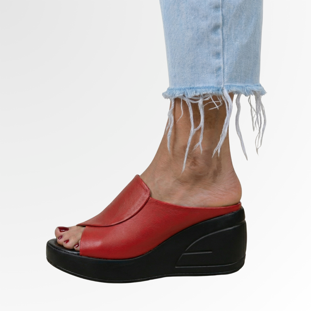 Elegant women's open-toe slip-on wedge sandals. Features orthopedic footbed & all-day comfort for summer footwear.