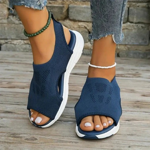Comfortable women's walking sandals with advanced arch support, ideal for all-day wear and outdoor sports.