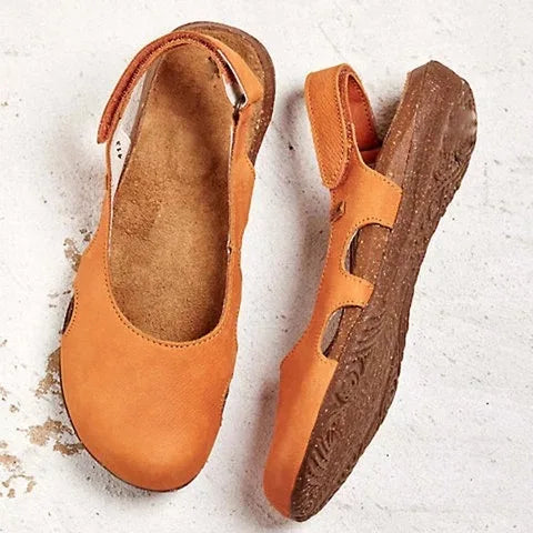 Supportive women's orthopedic sandals, ideal comfort footwear with adjustable straps for casual summer days.