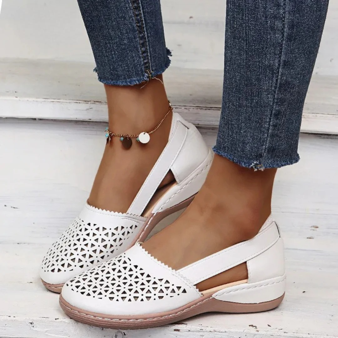 Stylish women's summer walking shoes with a chic cutout design. Perfect casual orthopedic footwear for spring fashion.
