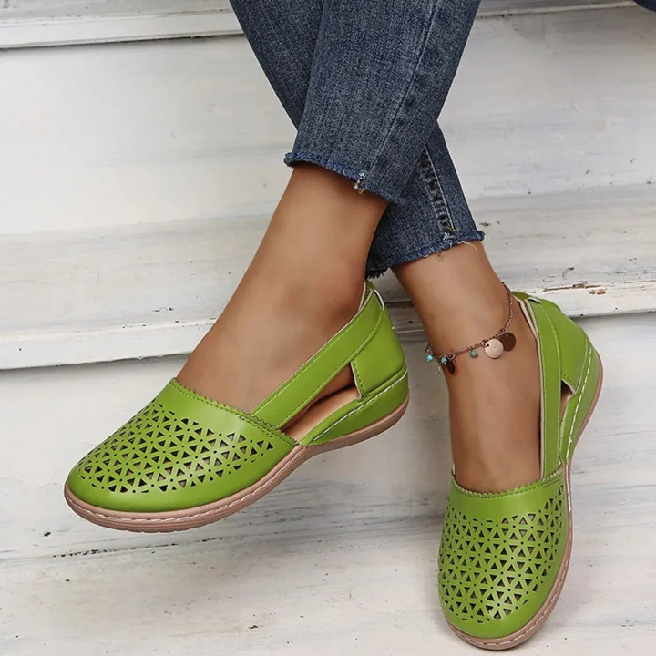 Breathable slip-on orthopedic women's casual shoes. Features a unique cutout design for ultimate summer comfort and foot health.