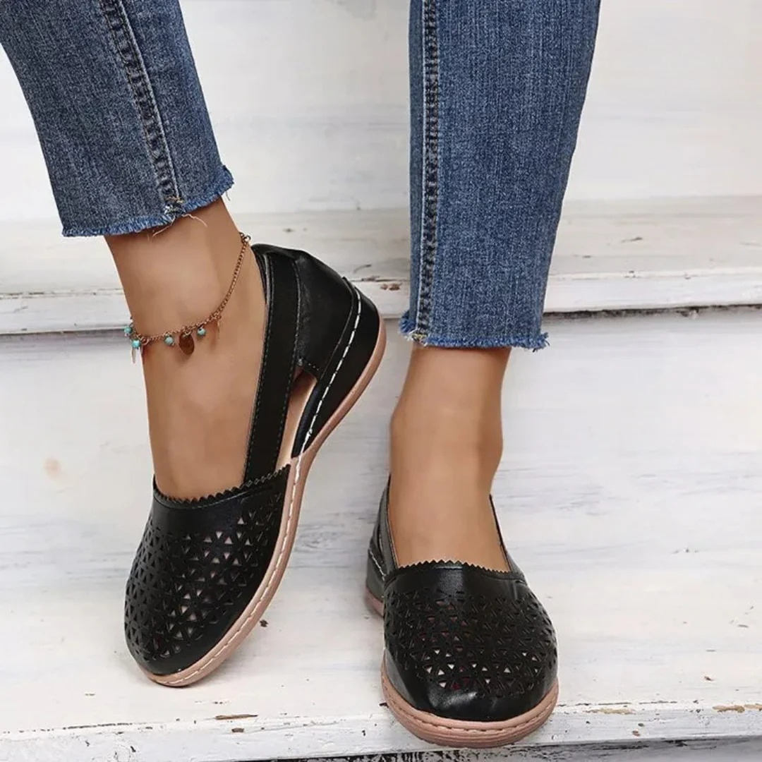 Close-up: Women's orthopedic summer shoes, highlighting the breathable cutout design, comfortable sole, & stylish casual look.
