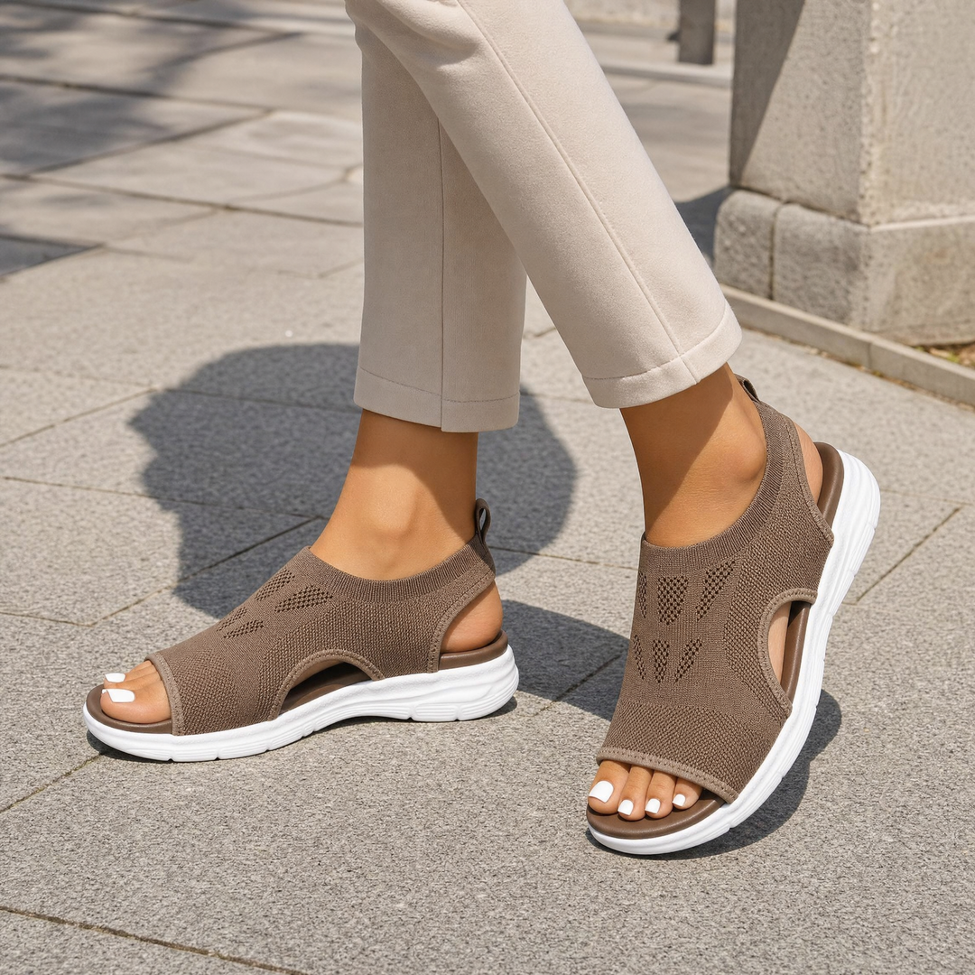 Comfortable women's orthopedic walking sandals featuring strong arch support & adjustable straps.