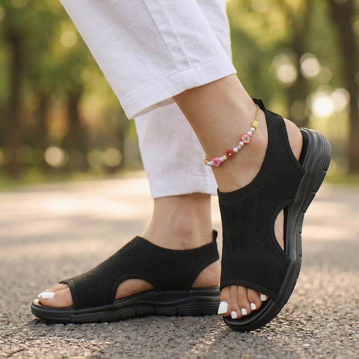 Non-slip women's walking sandals, orthopedic design with excellent arch support for secure steps.