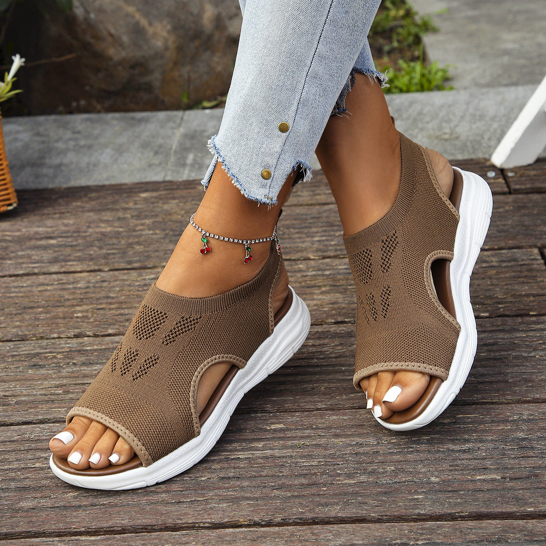 Lightweight women's orthopedic sandals with arch support & adjustable straps for all-day comfort.