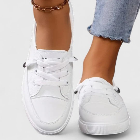 Comfortable women's orthopedic walking shoes with breathable design and arch support for daily wear.