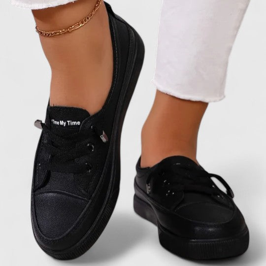 Detail of arch support in women's orthopedic walking shoes, designed for comfortable, supportive daily wear.