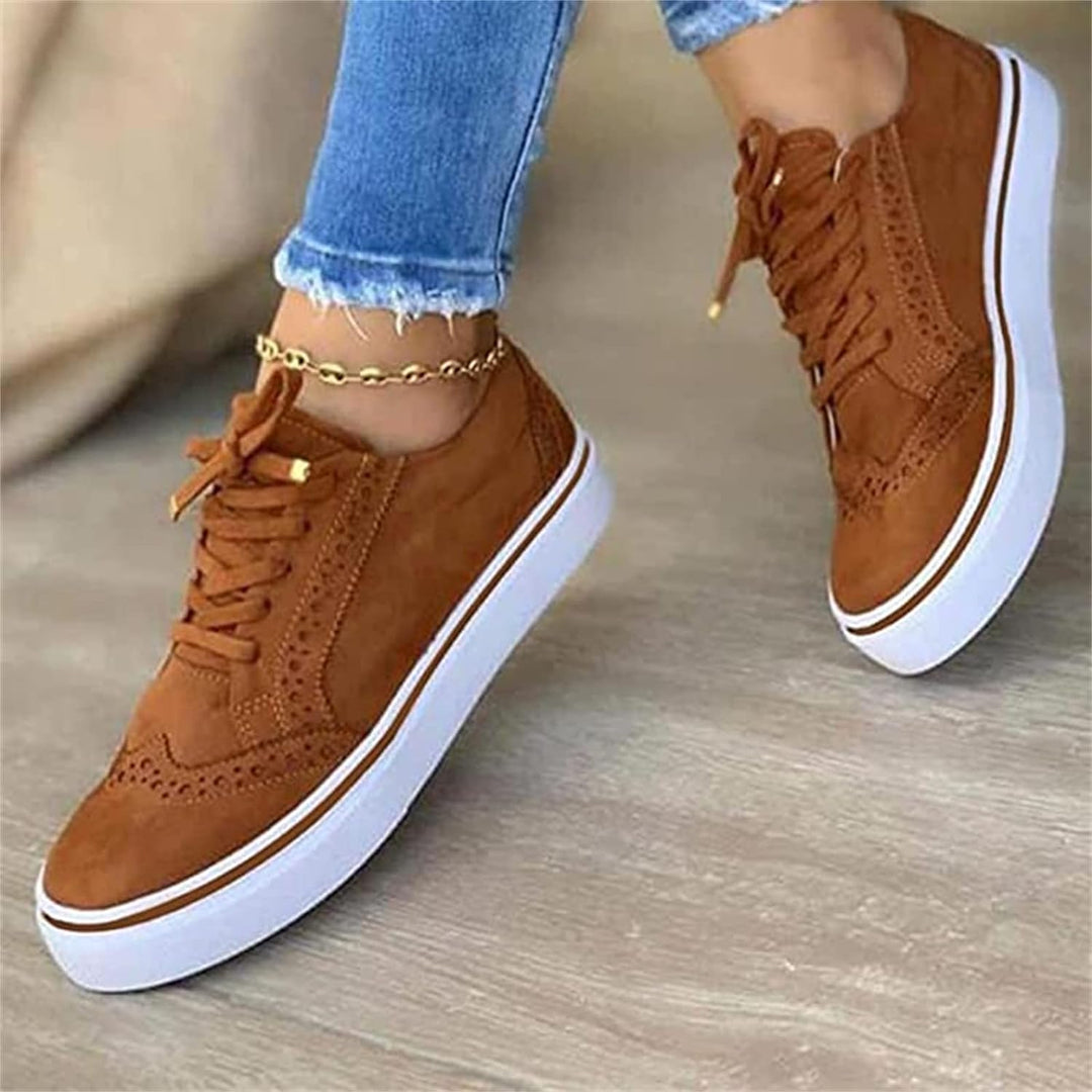Stylish women's comfort platform sneakers with secure lace-up design for trendy casual everyday fashion.