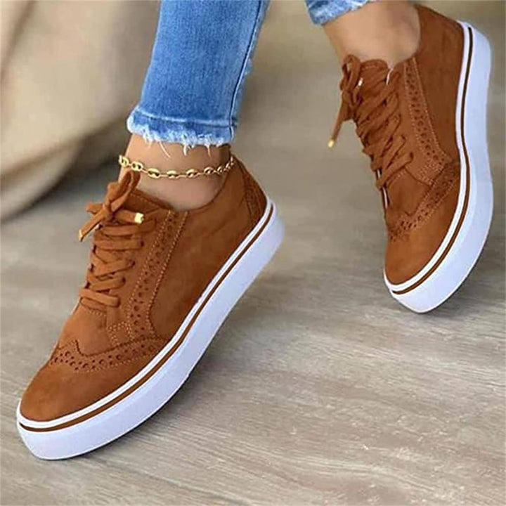 Stylish women's comfort platform sneakers with secure lace-up design for trendy casual everyday fashion.