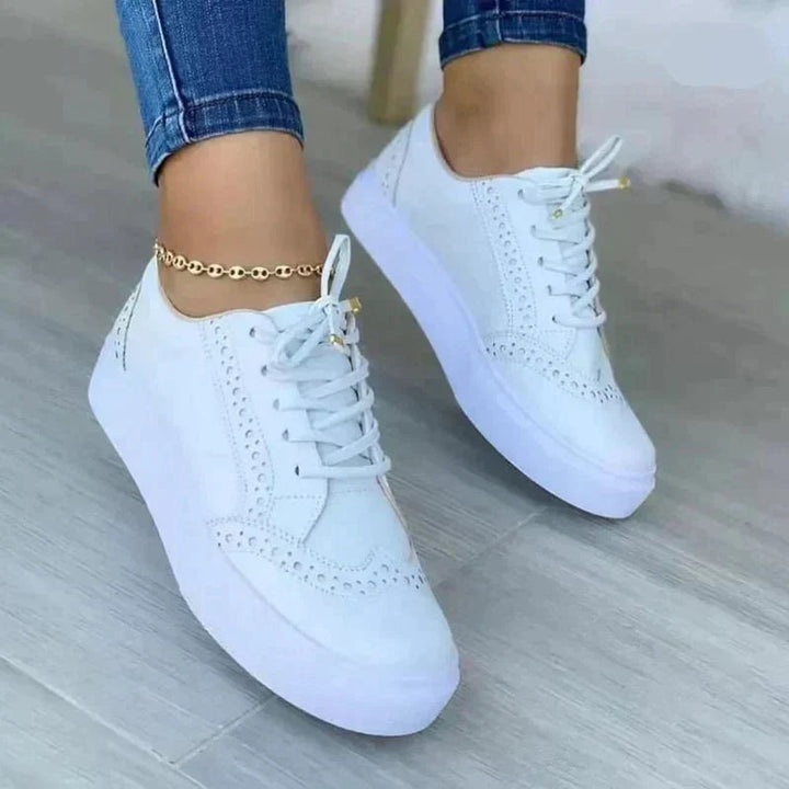 Platform lace-up women's sneakers combining stylish design with essential orthopedic support for all-day comfort.