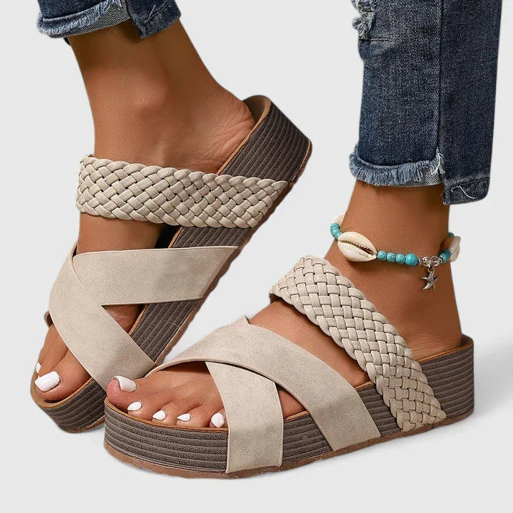 Comfortable orthopedic wedge platform sandals for women, featuring supportive design & stylish woven crossover straps.