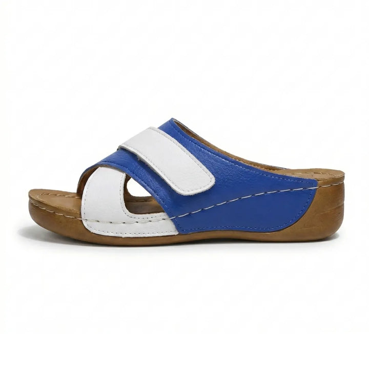 Strappy orthopedic wedge sandals for women, offering cushioned comfort & secure fit.