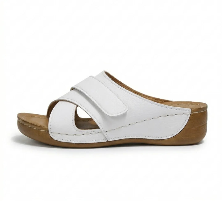 Women's foot support wedge sandals, orthopedic design with cushioned arch for comfort.