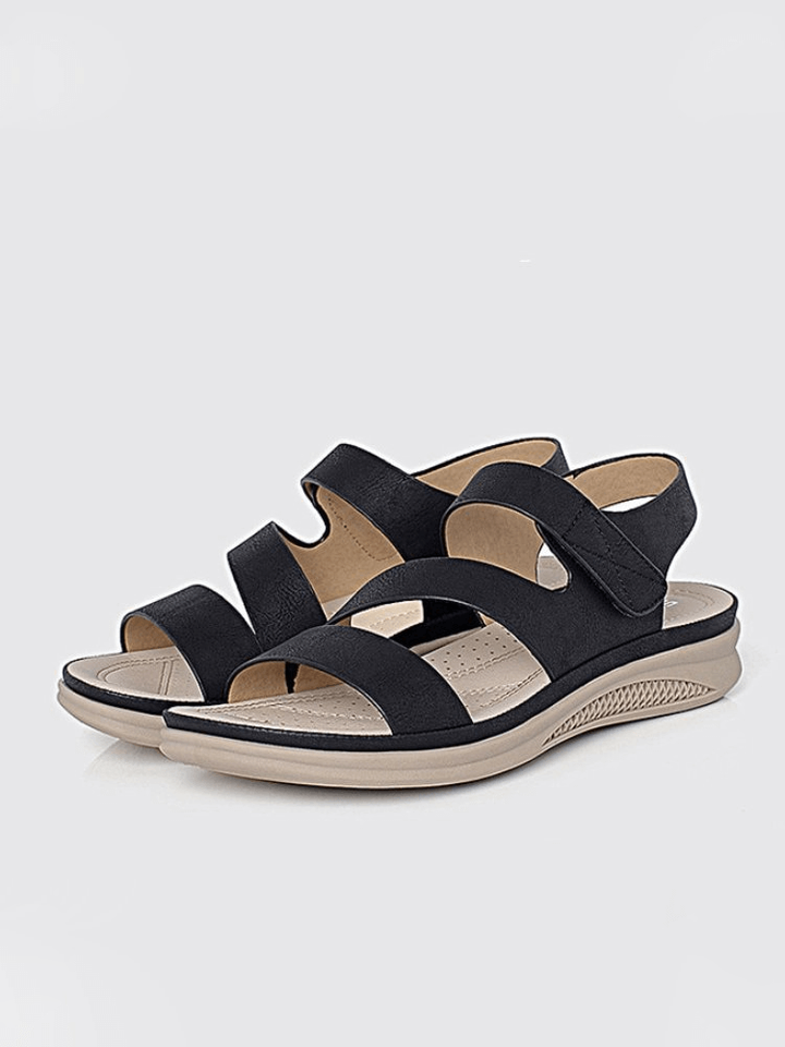 Elegant women's orthopedic wedge sandals featuring arch support, perfect for summer casual wear.