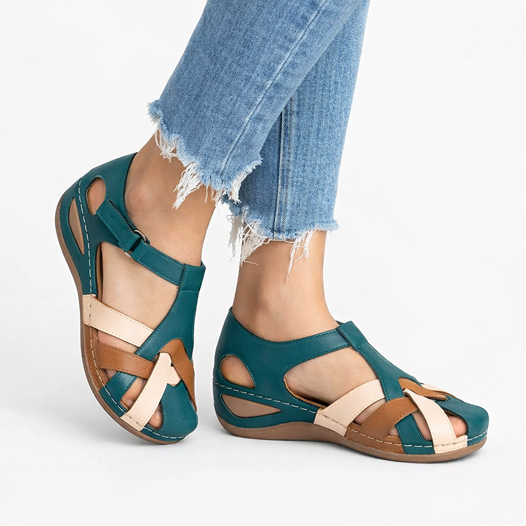 Comfortable women's orthopedic wedge sandals designed with arch support to reduce foot pain, great for casual summer outings.