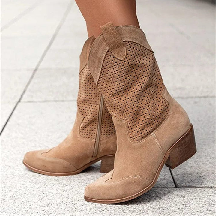 Women's orthopedic western boots with stylish design, comfort features, and block heel.