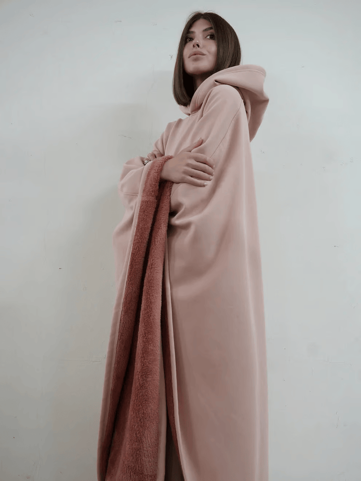 Warm women's oversize blanket hoodie, soft, ultimate relaxation wear.