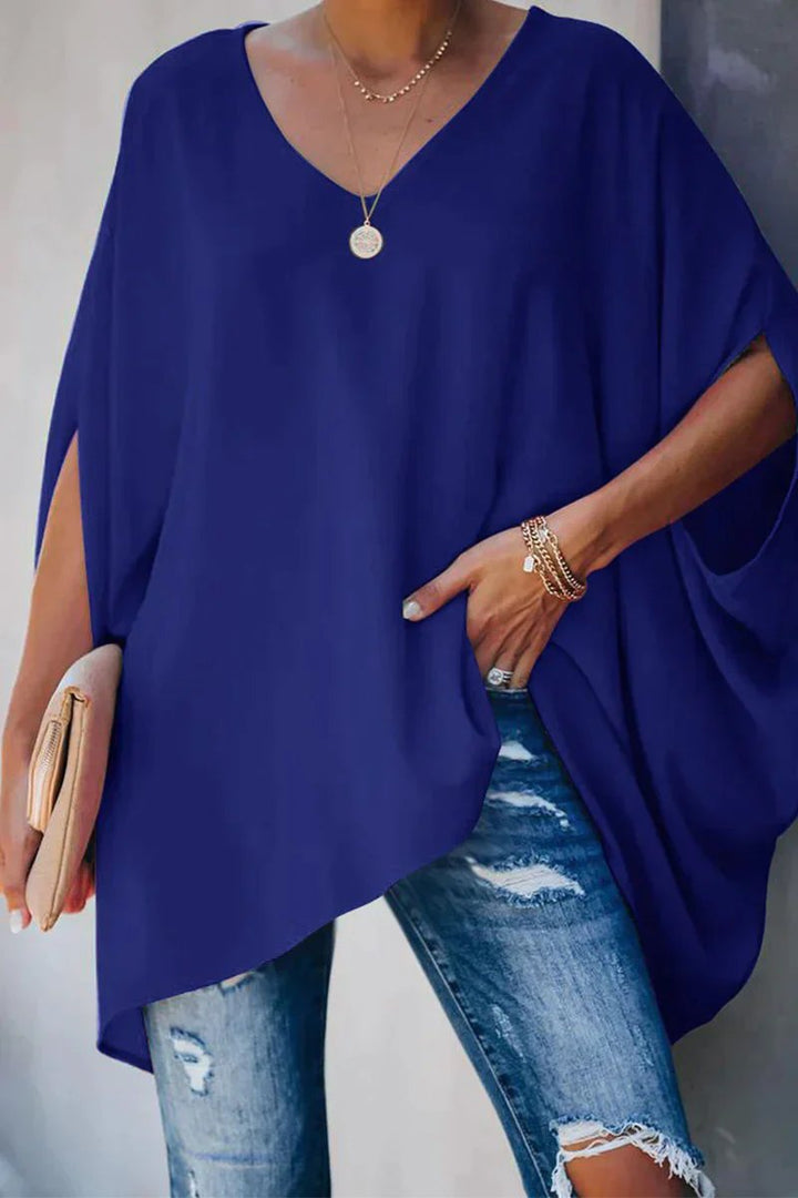Casual women's batwing sleeve V-neck oversized tunic top, ideal for comfortable everyday wear and relaxed fashion.