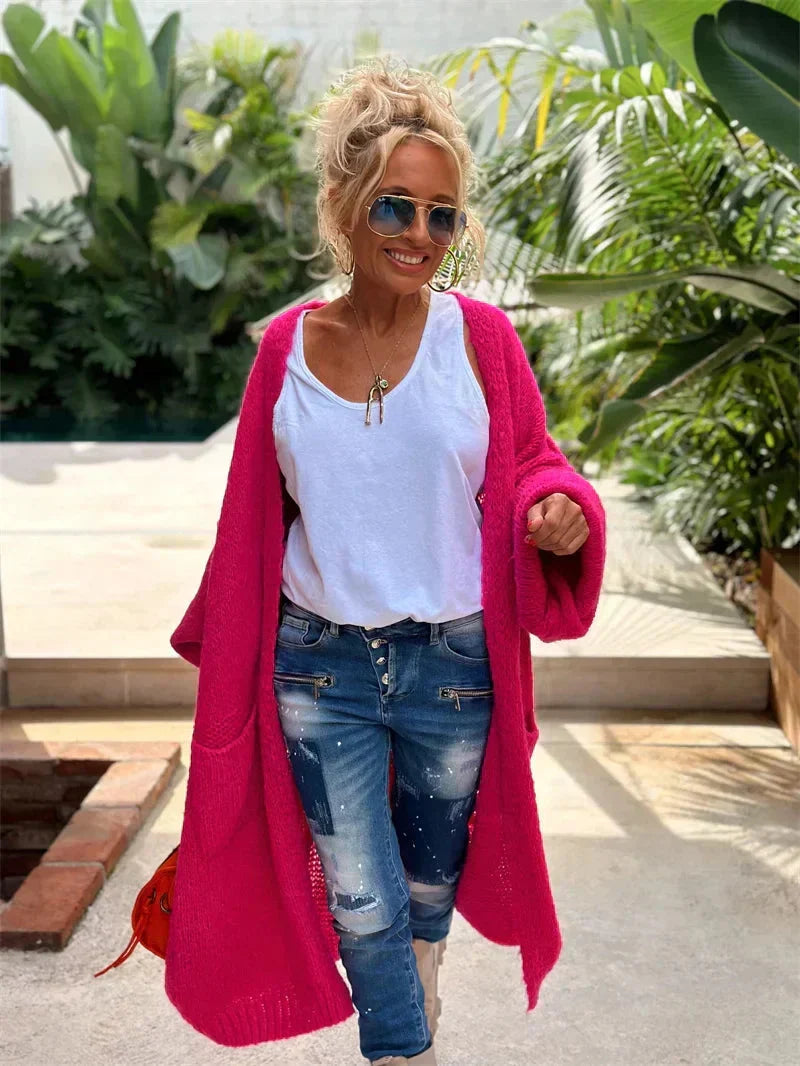 Vibrant oversized bohemian knit cardigan for women, longline & open front. A relaxed fit statement piece.