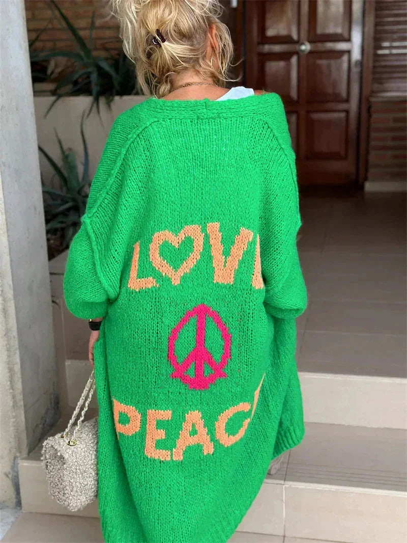 Statement piece: women's oversized bohemian knit cardigan. Longline, relaxed fit, open front for vibrant style.